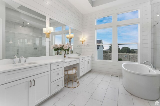4772 W Thorntree Ln, Herriman, UT 84096 - full bathroom featuring an inviting chandelier, tile patterned floors, a freestanding bath, vanity, and a stall shower