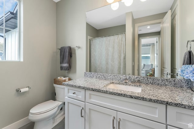 4772 W Thorntree Ln, Herriman, UT 84096 - full bath with toilet, vanity, and baseboards