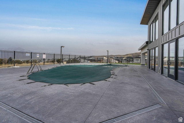4772 W Thorntree Ln, Herriman, UT 84096 - community pool with a residential view, a patio area, and fence