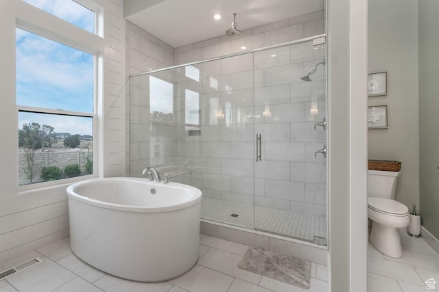 4772 W Thorntree Ln, Herriman, UT 84096 - full bathroom with tile patterned floors, toilet, a stall shower, visible vents, and a soaking tub