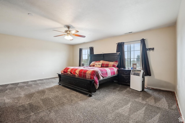 1030 S Barley Ln, Kaysville, UT 84037 - bedroom with dark carpet, visible vents, ceiling fan, and baseboards
