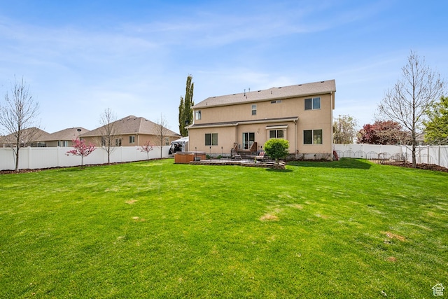1030 S Barley Ln, Kaysville, UT 84037 - back of house with stucco siding, a lawn, and a fenced backyard