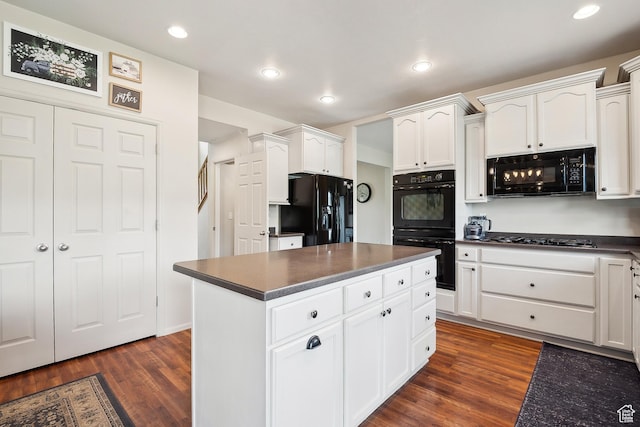 1030 S Barley Ln, Kaysville, UT 84037 - kitchen featuring dark wood finished floors, white cabinets, black appliances, and dark countertops