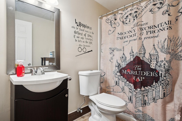 1030 S Barley Ln, Kaysville, UT 84037 - full bath featuring toilet, curtained shower, vanity, and baseboards