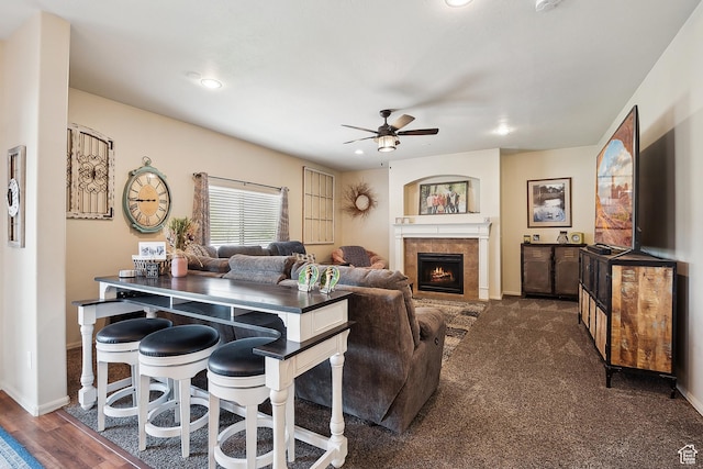 1030 S Barley Ln, Kaysville, UT 84037 - living area featuring a tiled fireplace, baseboards, ceiling fan, and recessed lighting