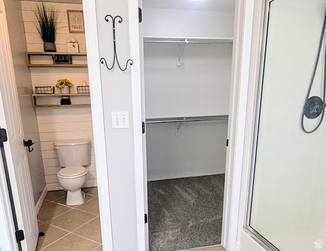 846 E 2200 S, Clearfield, UT 84015 - full bath featuring a walk in closet, a stall shower, and tile patterned floors