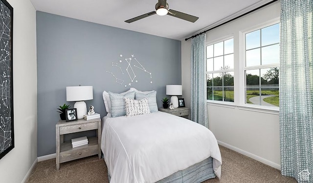 4107 W 2025 S Unit 52, Taylor, UT 84401 - carpeted bedroom featuring baseboards and ceiling fan