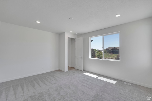4099 W 2025 S Unit 51, Taylor, UT 84401 - carpeted empty room featuring recessed lighting and baseboards