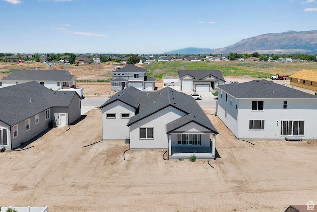4099 W 2025 S Unit 51, Taylor, UT 84401 - aerial view of residential area with a mountain backdrop