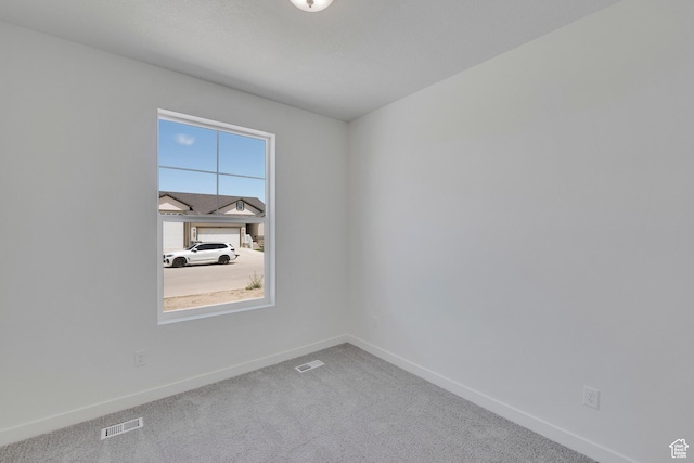 4099 W 2025 S Unit 51, Taylor, UT 84401 - carpeted spare room with baseboards
