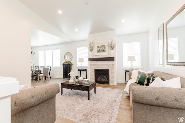 1076 E 300 S, Smithfield, UT 84335 - living area featuring baseboards, recessed lighting, a tile fireplace, light wood finished floors, and vaulted ceiling