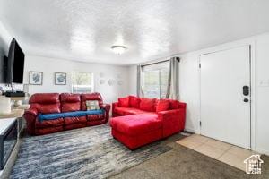 2959 S 9200 W, Magna, UT 84044 - living area with a textured ceiling and carpet flooring