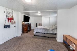 2959 S 9200 W, Magna, UT 84044 - carpeted bedroom with baseboards