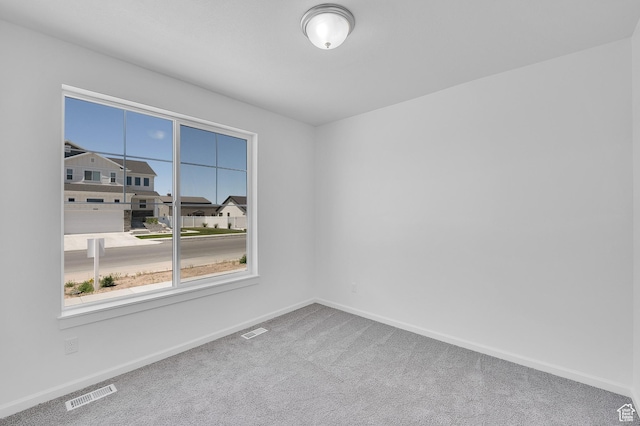 2074 S 3940 W Unit 11, Taylor, UT 84401 - spare room with carpet floors and baseboards