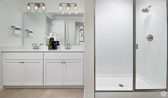 2074 S 3940 W Unit 11, Taylor, UT 84401 - bathroom featuring a tile shower, tile patterned flooring, and double vanity
