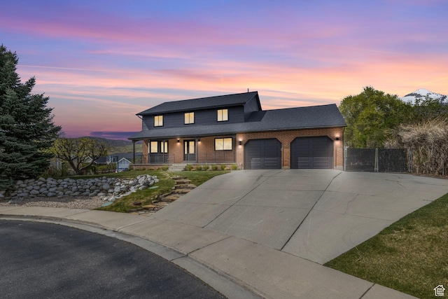 view of front of house featuring a porch, brick siding, fence, concrete driveway, and an attached garage