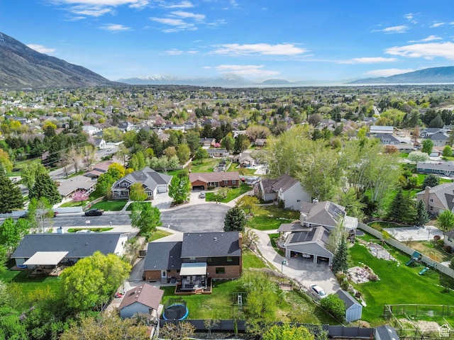 aerial view featuring a mountain view and a residential view