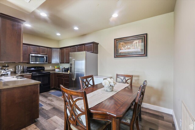 2153 N Springtime Dr, Saratoga Springs, UT 84045 - dining area featuring visible vents, recessed lighting, dark wood-style flooring, and baseboards