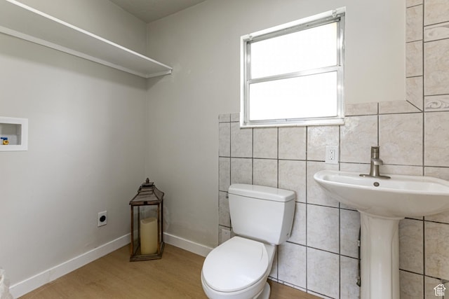 263 N 100 E, Springville, UT 84663 - half bath with toilet, tile walls, and wood finished floors
