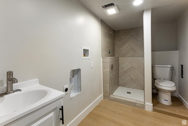 263 N 100 E, Springville, UT 84663 - full bath with wood finished floors, baseboards, and tiled shower