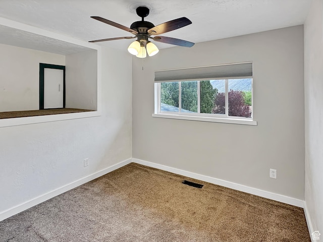886 E Hillcrest Dr, Springville, UT 84663 - carpeted spare room featuring ceiling fan, visible vents, and baseboards