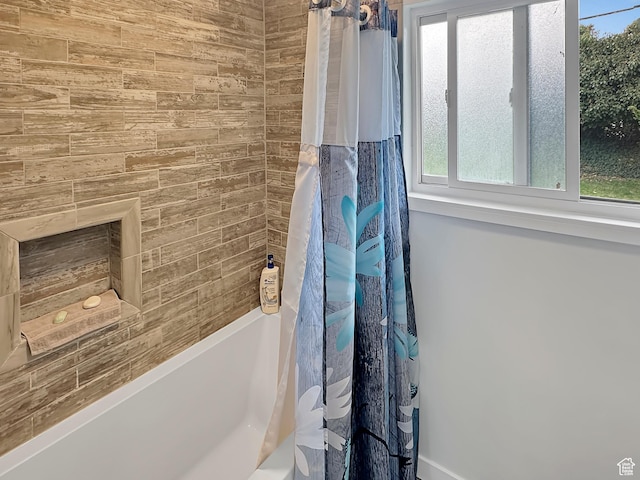 886 E Hillcrest Dr, Springville, UT 84663 - bathroom featuring shower / bath combo and a healthy amount of sunlight