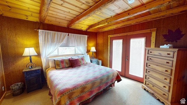 315 Abbey Rd, Moab, UT 84532 - bedroom featuring french doors, light colored carpet, beam ceiling, wood ceiling, and wood walls