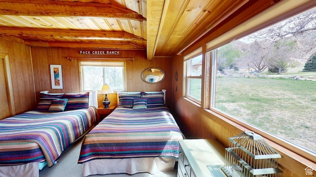 315 Abbey Rd, Moab, UT 84532 - bedroom featuring wooden ceiling, wooden walls, and beam ceiling