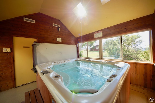 315 Abbey Rd, Moab, UT 84532 - miscellaneous room with a jacuzzi, wood walls, and high vaulted ceiling