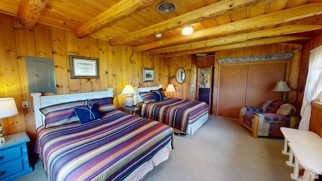 315 Abbey Rd, Moab, UT 84532 - bedroom with electric panel, beamed ceiling, wooden ceiling, carpet floors, and wood walls