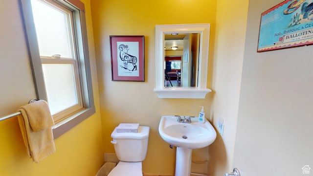 315 Abbey Rd, Moab, UT 84532 - half bathroom featuring toilet and a sink