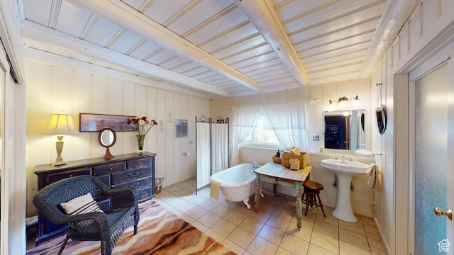 315 Abbey Rd, Moab, UT 84532 - bathroom featuring tile patterned floors, a soaking tub, and beamed ceiling