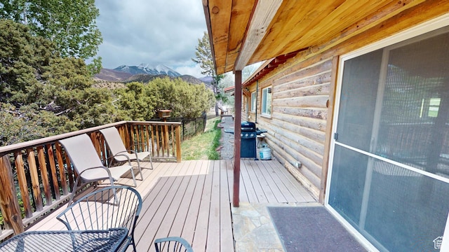 315 Abbey Rd, Moab, UT 84532 - wooden deck with a grill and a mountain view