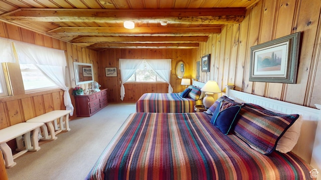 315 Abbey Rd, Moab, UT 84532 - bedroom with wood walls, wood ceiling, beam ceiling, and light colored carpet