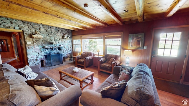 315 Abbey Rd, Moab, UT 84532 - living room with hardwood / wood-style flooring, wood ceiling, beam ceiling, plenty of natural light, and wooden walls