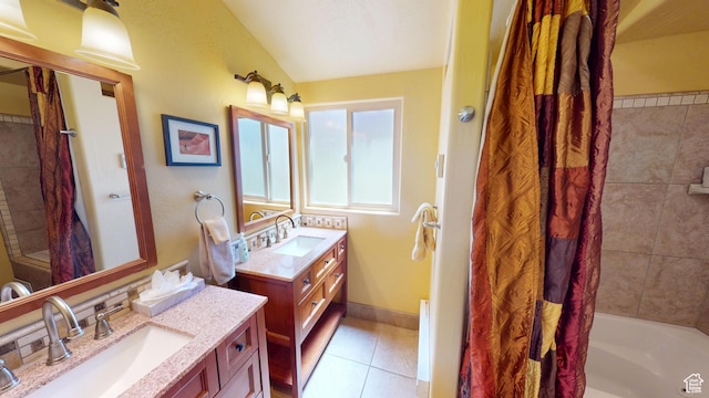 315 Abbey Rd, Moab, UT 84532 - bathroom featuring tile patterned flooring, shower / bath combination with curtain, and two vanities