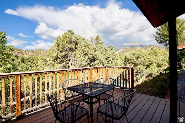315 Abbey Rd, Moab, UT 84532 - wooden terrace featuring outdoor dining area and a mountain view