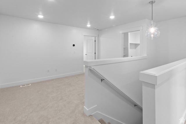 interior space with carpet, visible vents, recessed lighting, and baseboards