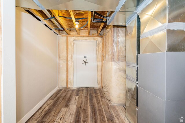 9568 N 5600 W, Elwood, UT 84337 - interior space with baseboards, wood finished floors, and heating unit