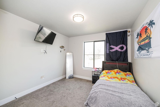 9568 N 5600 W, Elwood, UT 84337 - carpeted bedroom featuring baseboards