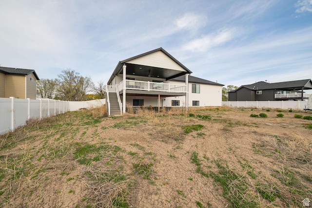 9568 N 5600 W, Elwood, UT 84337 - back of house featuring fence, stairway, and a wooden deck