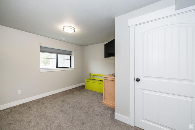 9568 N 5600 W, Elwood, UT 84337 - unfurnished bedroom with visible vents, carpet floors, and baseboards