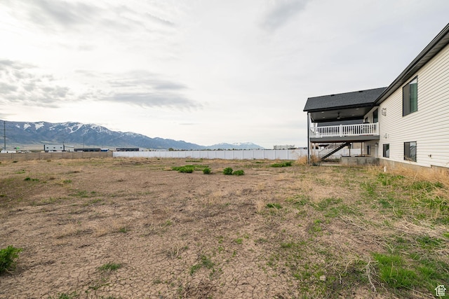 9568 N 5600 W, Elwood, UT 84337 - view of yard featuring a mountain view, stairway, and fence