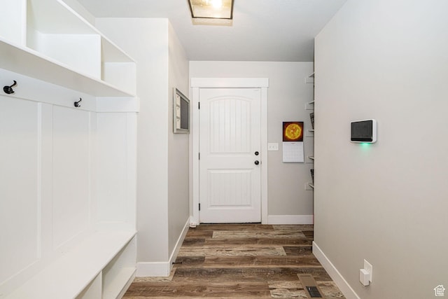 9568 N 5600 W, Elwood, UT 84337 - mudroom featuring baseboards, visible vents, and wood finished floors