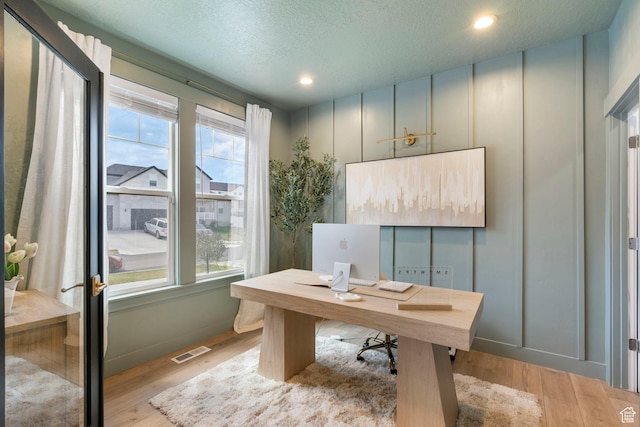 2862 S Preening Way, Saratoga Springs, UT 84045 - office space with visible vents, light wood-style floors, a textured ceiling, and recessed lighting