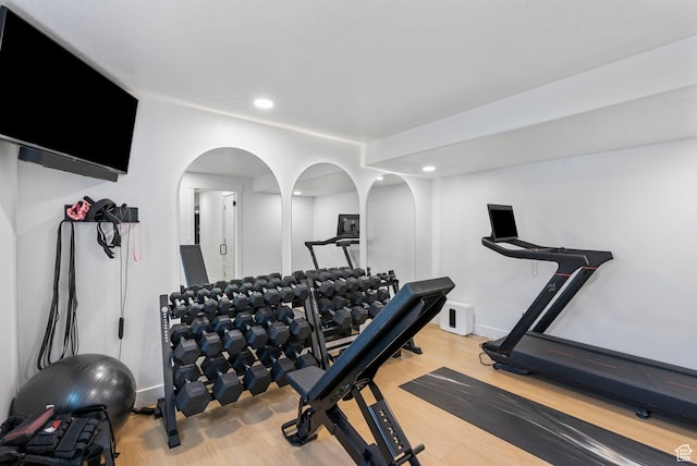 2862 S Preening Way, Saratoga Springs, UT 84045 - exercise room featuring recessed lighting, arched walkways, wood finished floors, and baseboards