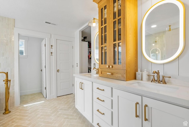 2862 S Preening Way, Saratoga Springs, UT 84045 - full bathroom with a tile shower, a sink, brick floor, and visible vents