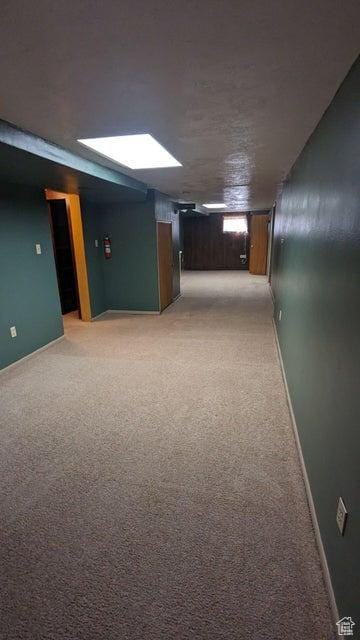 252 N Highland Dr, Cedar City, UT 84721 - finished below grade area with baseboards and light carpet