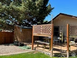 252 N Highland Dr, Cedar City, UT 84721 - exterior space with fence and a wooden deck