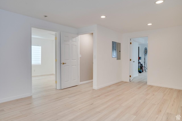 676 S 620 E, Heber City, UT 84032 - unfurnished room featuring light wood finished floors, recessed lighting, baseboards, electric panel, and a pendent fire sprinkler